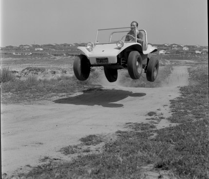 Bruce Meyers, circa 1966, in one of his Meyers Manx dune buggies. 