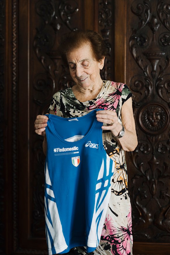 Mazzenga shows off her “lucky vest” at home in Padua, Italy.