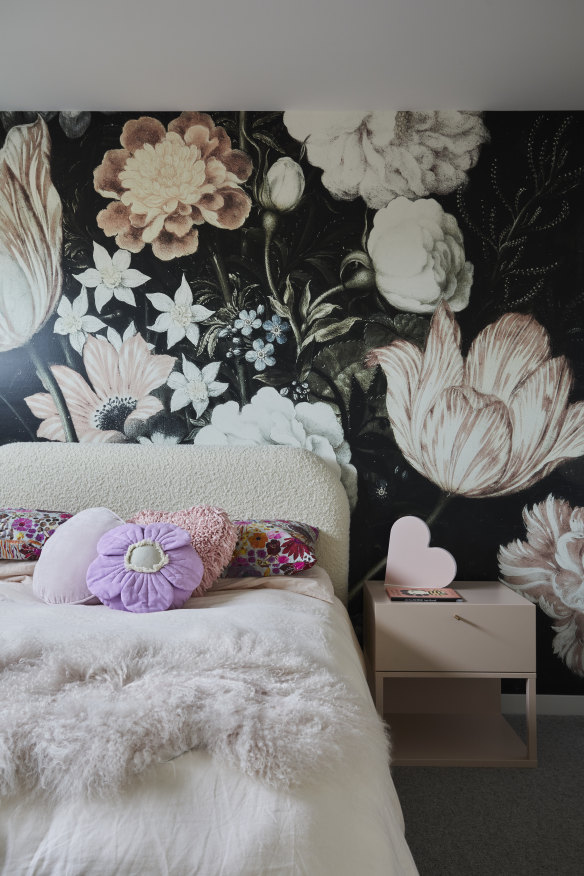Rosie’s sweet floral-inspired bedroom features ‘Blossoms’ wallpaper by Anewall, a bedhead by Heatherley Designs and a bedside table from Grazia and Co.  
