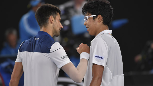Novak Djokovic congratulates Hyeon Chung after the South Korean defeated him at the Australian Open on Monday, January 22.