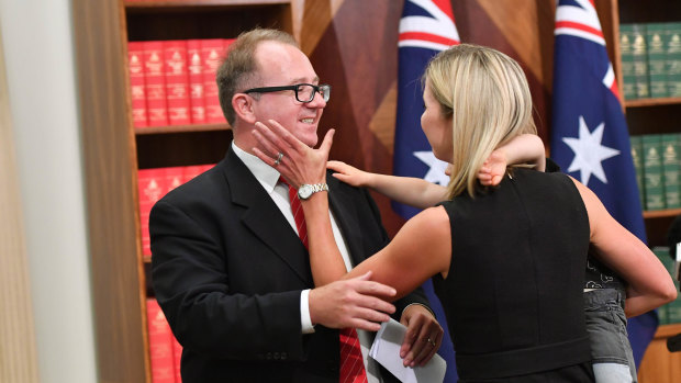 David Feeney, with his wife Liberty Sanger, announces his resignation from politics.