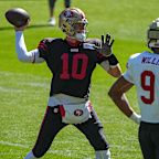 San Francisco 49ers quarterback Mac Jones works out during practice in Melbourne.