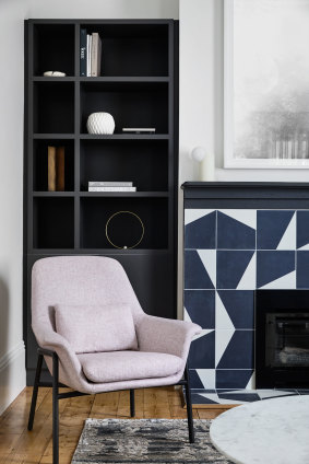 The original working fireplace in the formal lounge room of this Victorian-era house in Ballarat has been artfully contemporised.