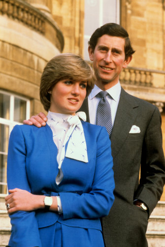Charles and Diana pose together at Buckingham Palace after the engagement announcement.