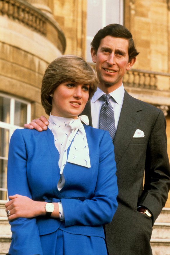 Charles and Diana pose together at Buckingham Palace after the engagement announcement.