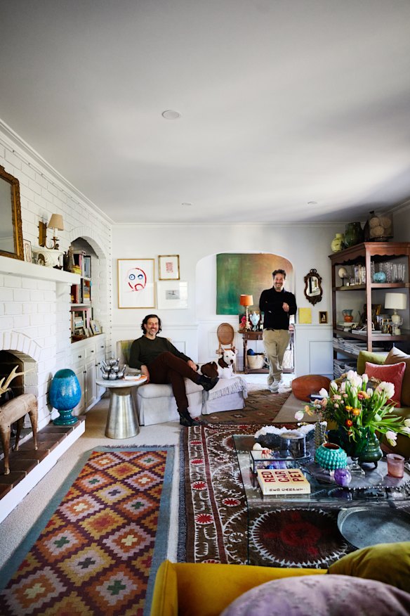“This home is a ’70s split-level that’s confused whether it’s American colonial or Mediterranean Spanish – a perfect canvas,” says Steven Maccora (standing).