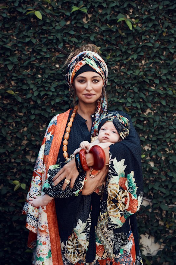 Camilla “Geisha Girl” kimono coat, $599, “Queen of Kings” kimono blouse, $549, and “Queen of Hearts” headband, $79. Dinosaur Designs “Boulder” bangle, $105. Elsa Peretti for Tiffany & Co. bangles, $670 each. Other jewellery, her own.