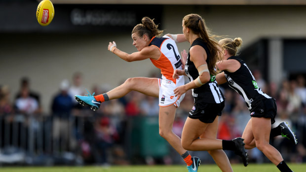 Kicking on: Greater Western Sydney's Alicia Eva breaks free of Collingwood's defence.