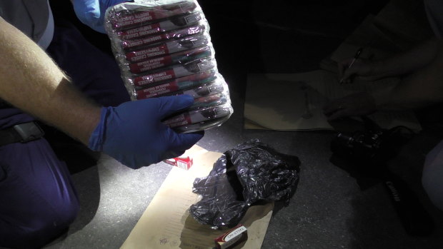 Among the contraband seized by officers was 30 pouches of tobacco. 