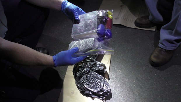 NSW Corrective Services officers seized a large amount of contraband from a Goulburn prison, including three mobile phones and unidentified powder.