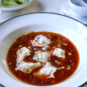 San xian dumplings in Sichuan chilli oil.