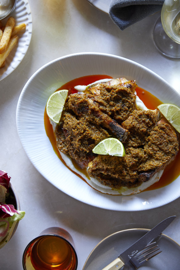 Bakar chicken coated in a fragrant paste of shallot, garlic, ginger, sweet soy, lemongrass, turmeric, makrut lime and palm sugar.