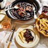 Grill-striped oyster mushroom “steaks” are served with sauce au poivre.