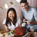 RecipeTin Eats’ Nagi Maehashi and Jean-Baptiste Alexandre with the maple-glazed ham. 