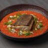 Pan-seared hiramasa king fish fillet with Thai Yai relish and cherry tomato purée.