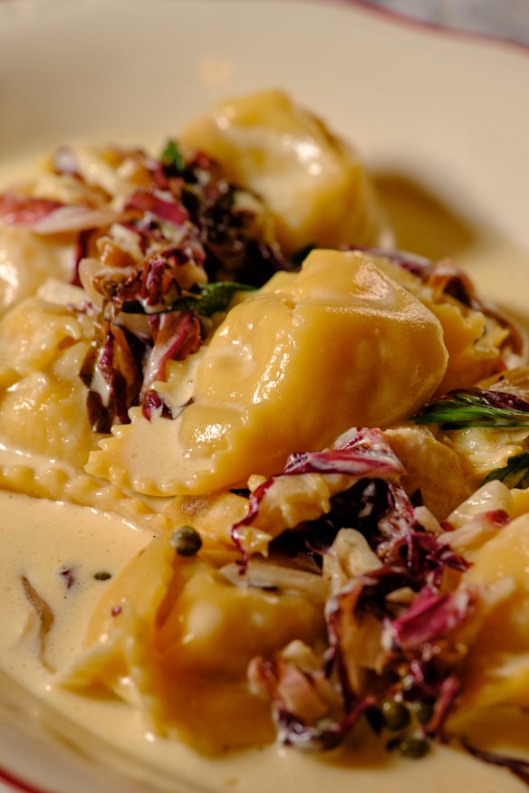 Ricotta tortellini with artichoke, radicchio and milk sauce.