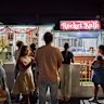 Customers outside Rocket Kulfi.