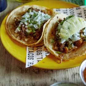 Chipotle barbacoa beef taco and al pastor.