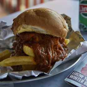 Chip butty with butter chicken gravy.