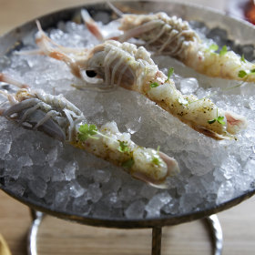 Raw scampi with white soy and seaweed vinegar.