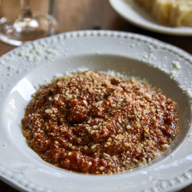 Honeycomb ox-tripe with tomato sauce and pecorino.