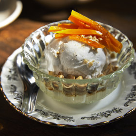 Homemade coconut ice cream with candied pumpkin.