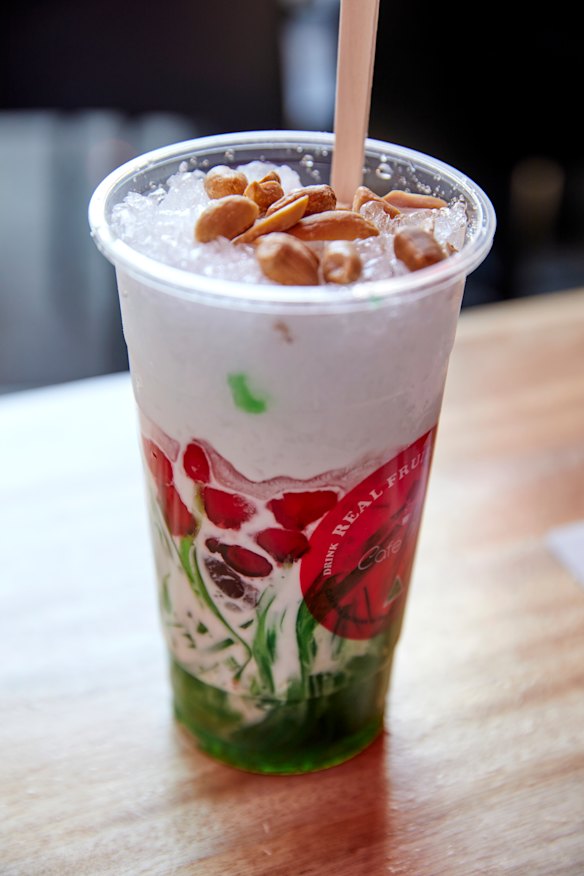 Cafe Nho’s che nho featuring pandan and coconut jelly and red rubies over shaved ice, with coconut milk.