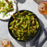 Edamame with spicy garlic sauce.