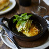 Go-to dish: Wood-baked halloumi with pear and Malfroy’s Gold honey (plus optional rosemary flatbread, top left).