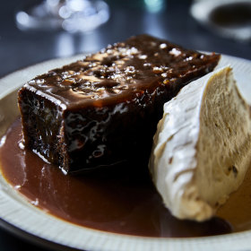 Sticky-date cake with pecan praline and creme fraiche.