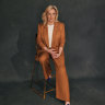 Christine wears Ginger & Smart jacket and pants, her own blouse, Saint Laurent shoes, and David Yurman jewellery.