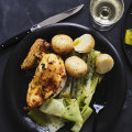 Mustard and herb roasted chicken breast with buttered leeks.