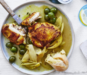 Baked chicken cutlets with olives and fennel seed.