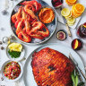 Adam Liaw’s Spanish-inspired Christmas recipes including smoky honey-glazed ham with piquillo pepper salsa (left) and prawns with paprika aioli