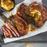 Rib-eye steaks with hot butter.