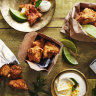 Fish pakoras with turmeric yoghurt and lime.