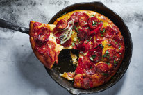 Using store-bought dough gives you a fast track to American-style pepperoni deep-dish pizza.