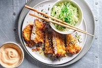 Pork schnitzel with Sriracha Kewpie and Japanese seaweed slaw.
