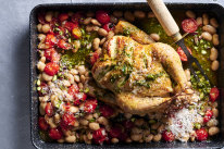 Tomato, bean and chicken tray bake with mint pesto.