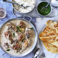 Serve this creamy, coconutty chicken curry with mint chutney, rice and roti.