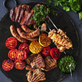 Adam Liaw’s mixed grill with salsa verde and roasted tomatoes.