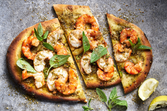 Be as generous with the prawns as you like when making these manoush-style pizzas at home.