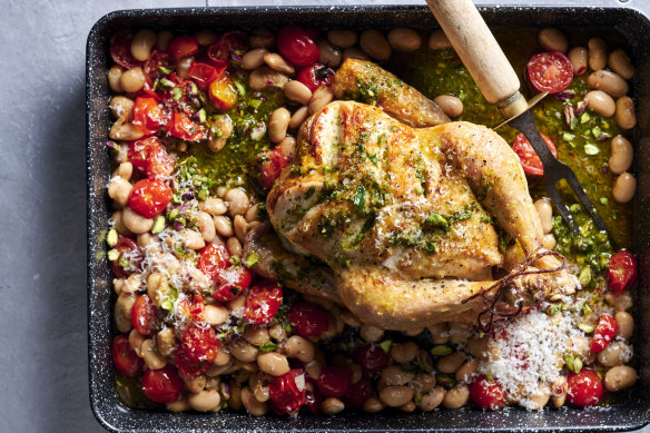 Tomato, bean and chicken tray bake with mint pesto.