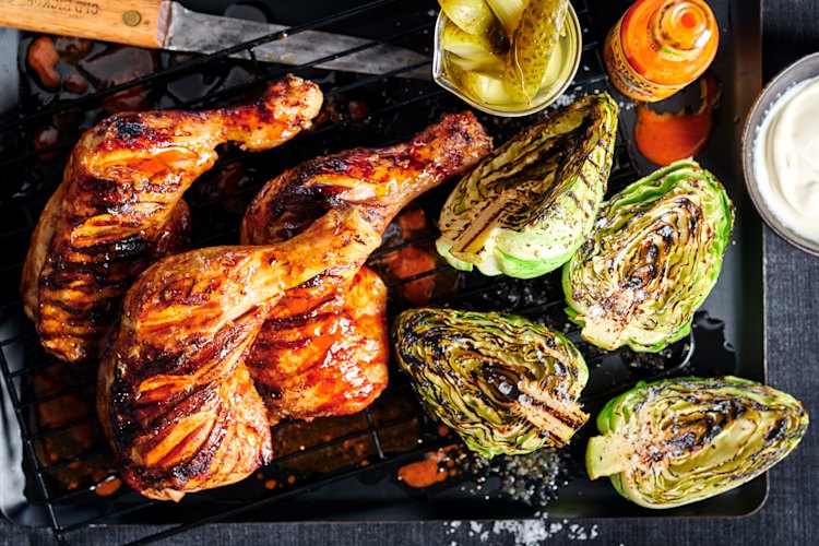 Chargrilled buffalo chicken with grilled cabbage and ranch dressing.