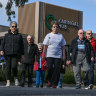 Much loved group: Members of Karingal Hub Walkers outside the shopping centre, in Frankston, this week.