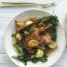 Braised duck with bacon, prunes and kale.