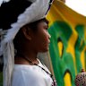 An Indigenous youth takes part in a demonstration to pressure leaders to implement a just energy transition and to phase out fossil fuels, ahead of the country hosting the COP30 U.N. Climate Summit, in front of the Itamaraty Palace, in Brasilia, Brazil.