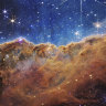 The edge of a young star-forming region NGC 3324 in the Carina Nebula, as captured by the James Webb Space Telescope.