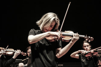 Satu Vanska, pictured, and Helena Rathbone played from opposite sides of the stage with cello and continuo in the middle.