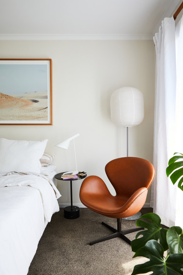 “My bedroom gets the most glorious natural light. It has another Danish classic – the Arne Jacobsen ‘Swan’ chair – paired with the rice paper lampshade by Hay.”